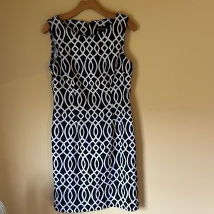 Sleeveless Patterned Sheath Dress. Perfect for business. Finish look with Blazer